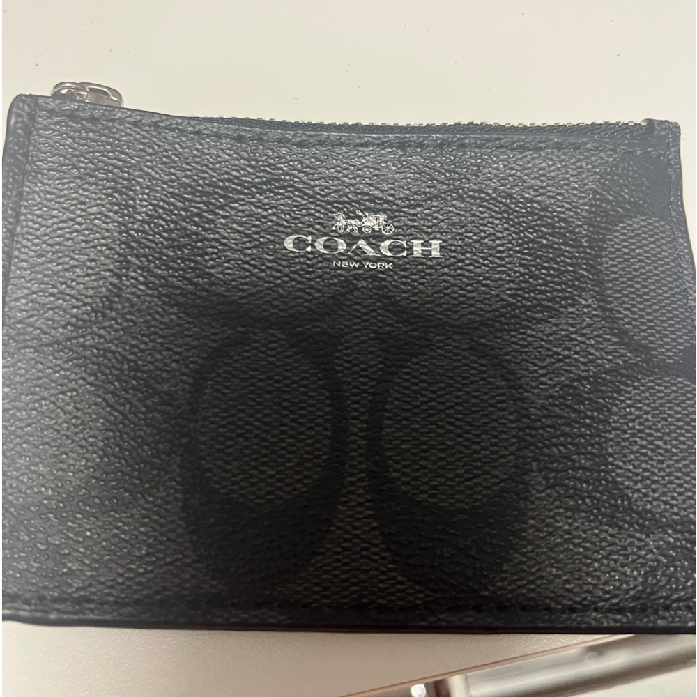 Very cute coach coin pure key Chain .
